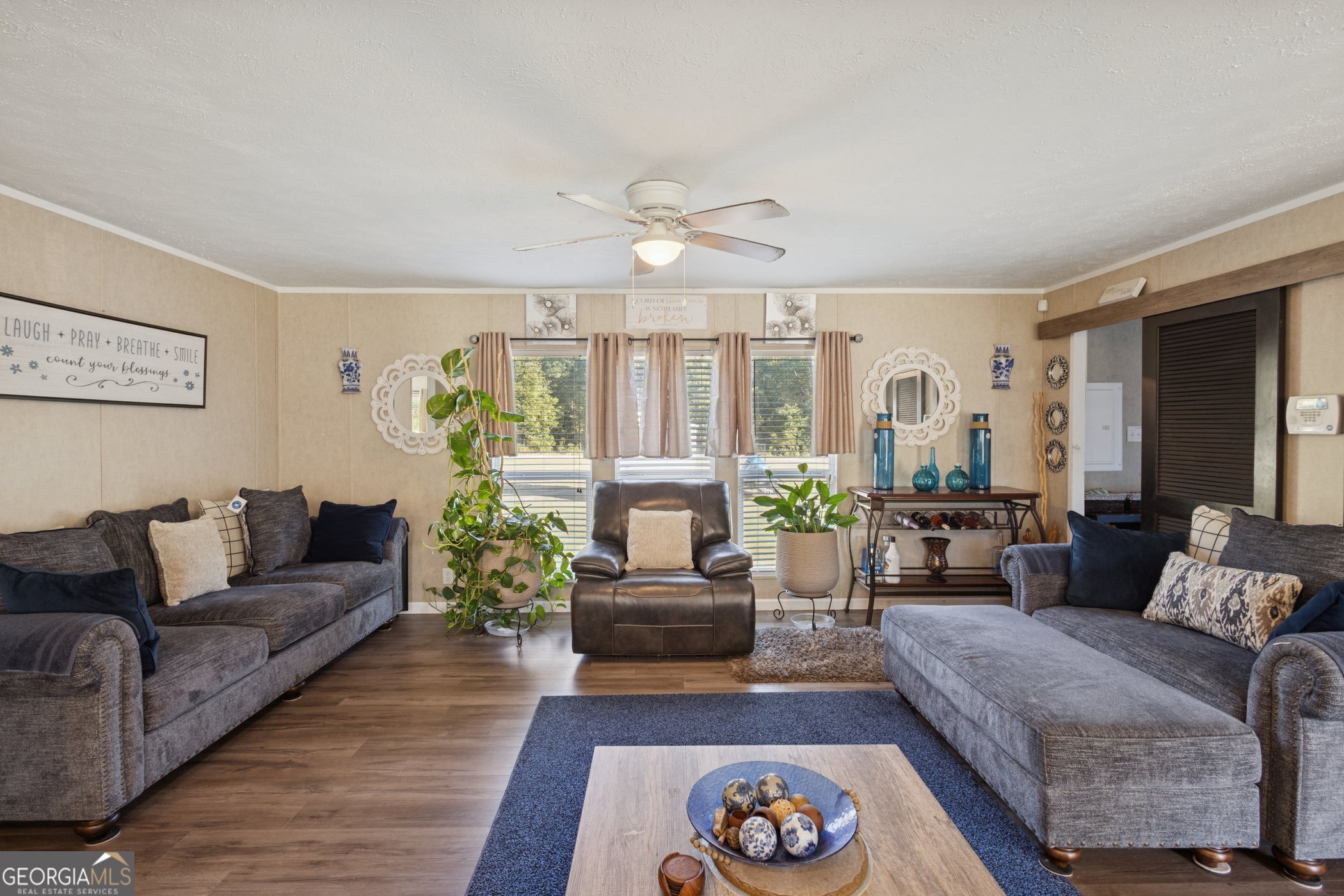 1238 Reedsville Road Clyo, GA 31303 - Photo 12 of 30 a living room with furniture and a large window