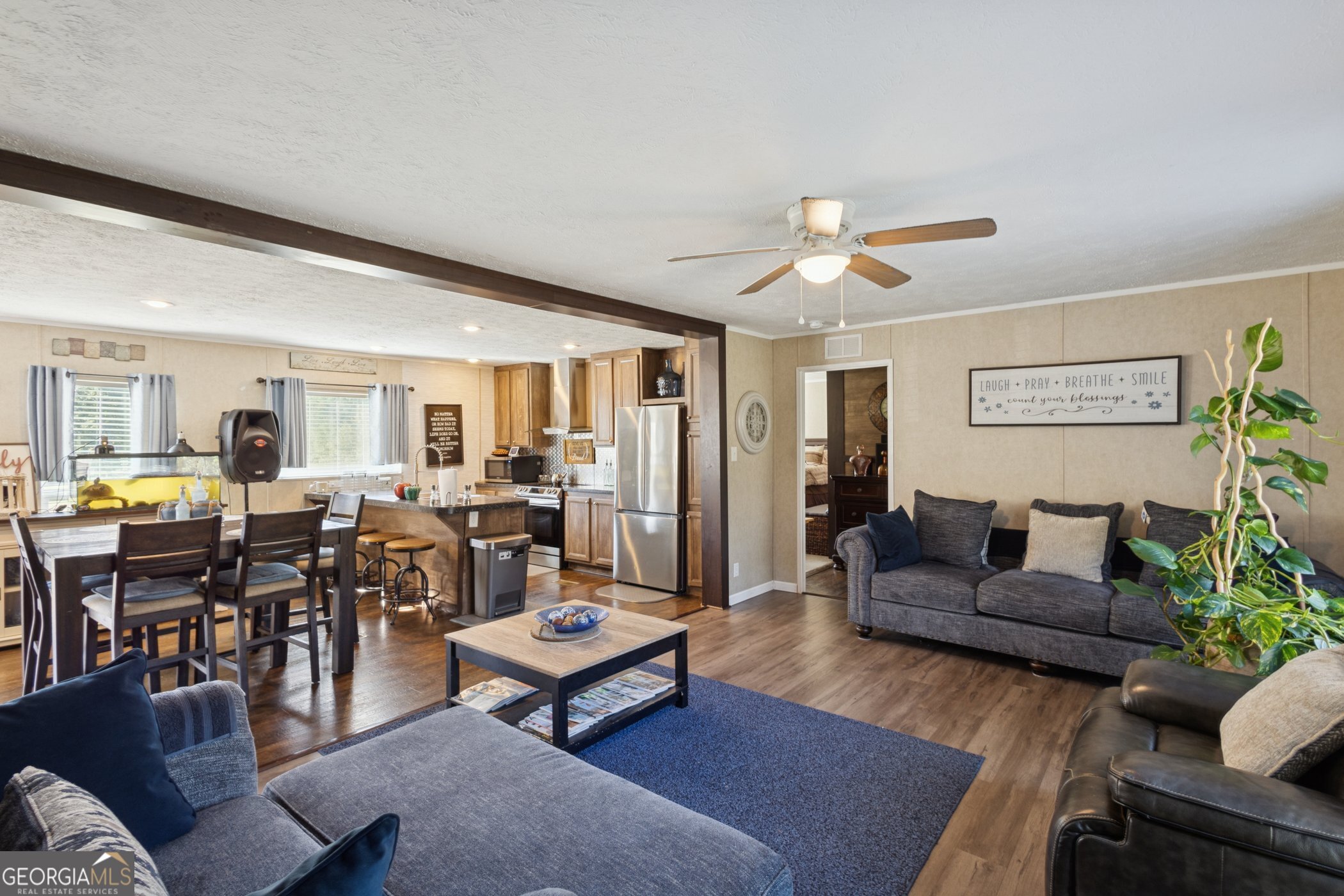 1238 Reedsville Road Clyo, GA 31303 - Photo 13 of 30 a living room with furniture potted plant and kitchen view
