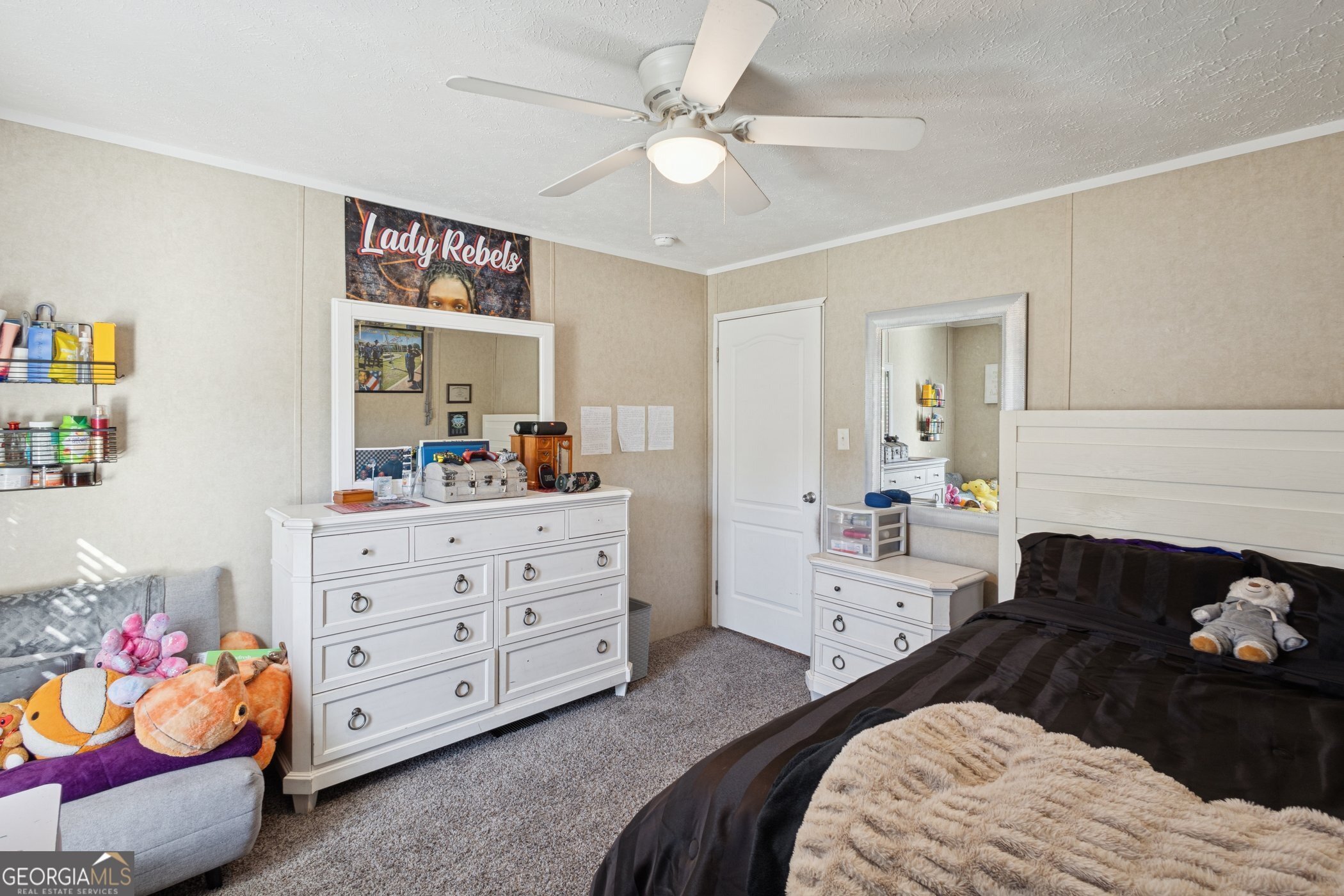 1238 Reedsville Road Clyo, GA 31303 - Photo 20 of 30 a bedroom with a bed and a dresser in it
