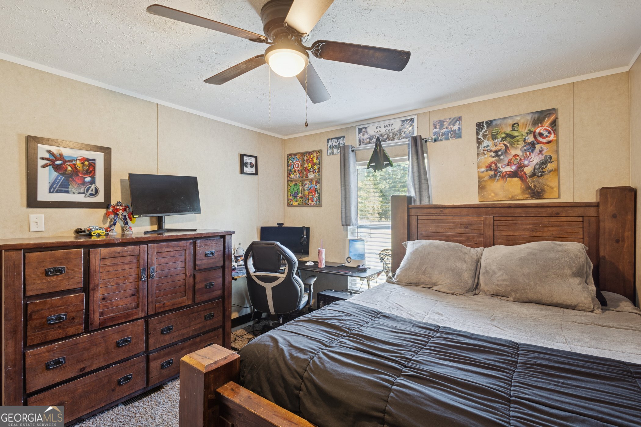1238 Reedsville Road Clyo, GA 31303 - Photo 22 of 30 a bedroom with a bed and a flat screen tv