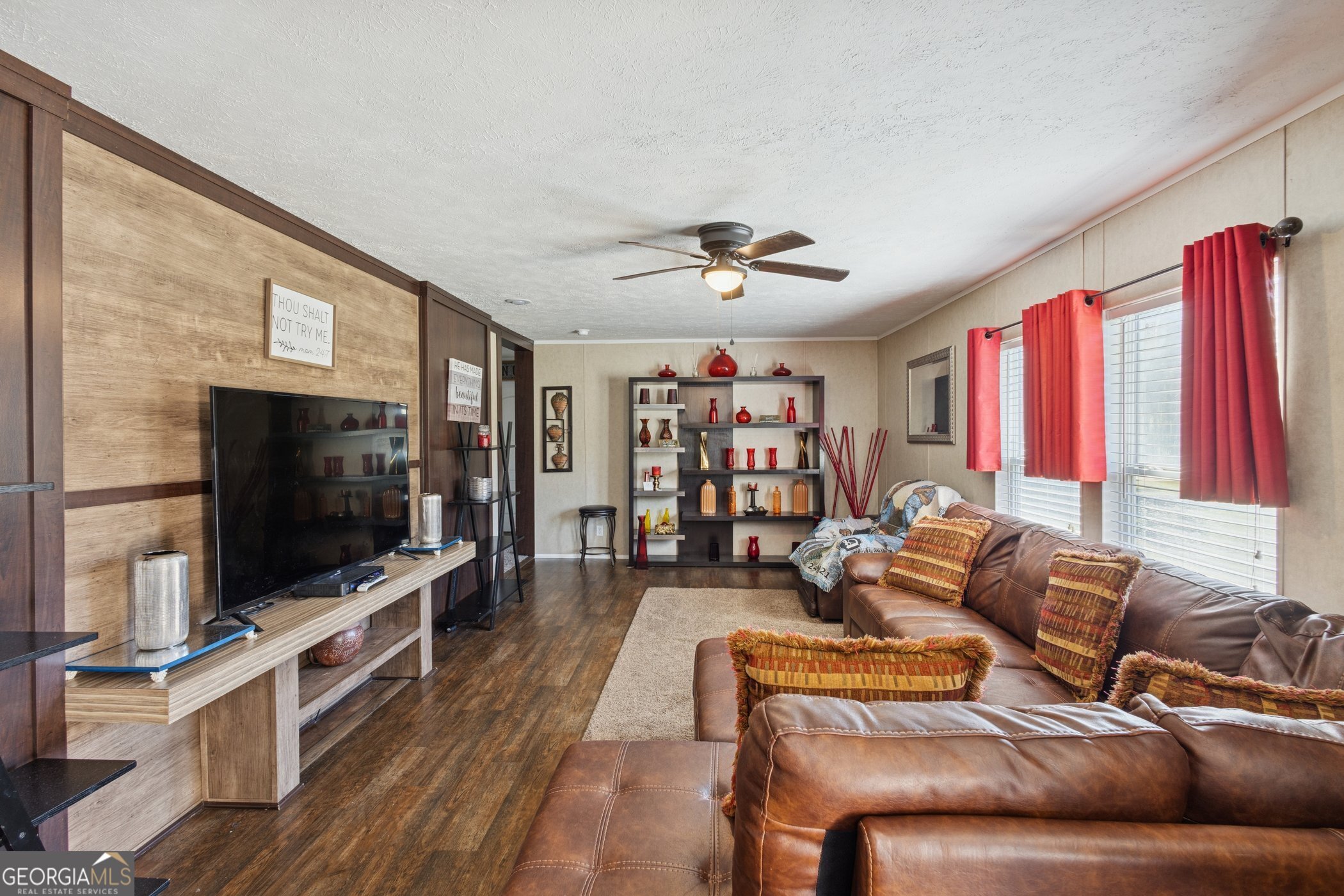 1238 Reedsville Road Clyo, GA 31303 - Photo 3 of 30 a living room with furniture and a flat screen tv