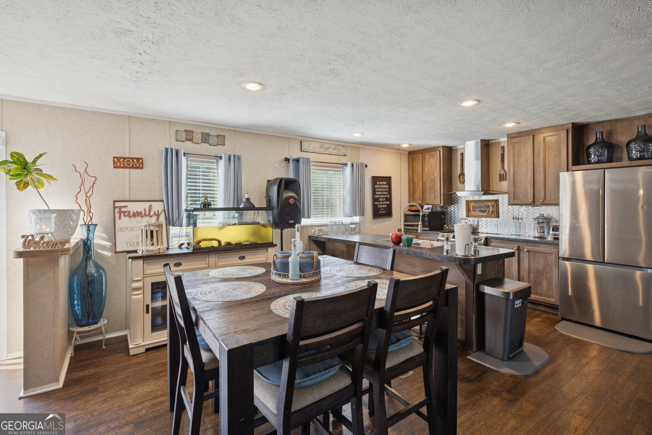 1238 Reedsville Road Clyo, GA 31303 - Photo 10 of 30 a view of a dining room with furniture and wooden floor