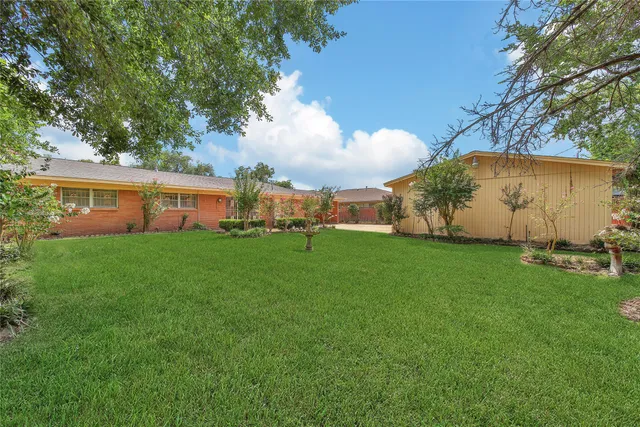 a picture of a bathroom with a shower