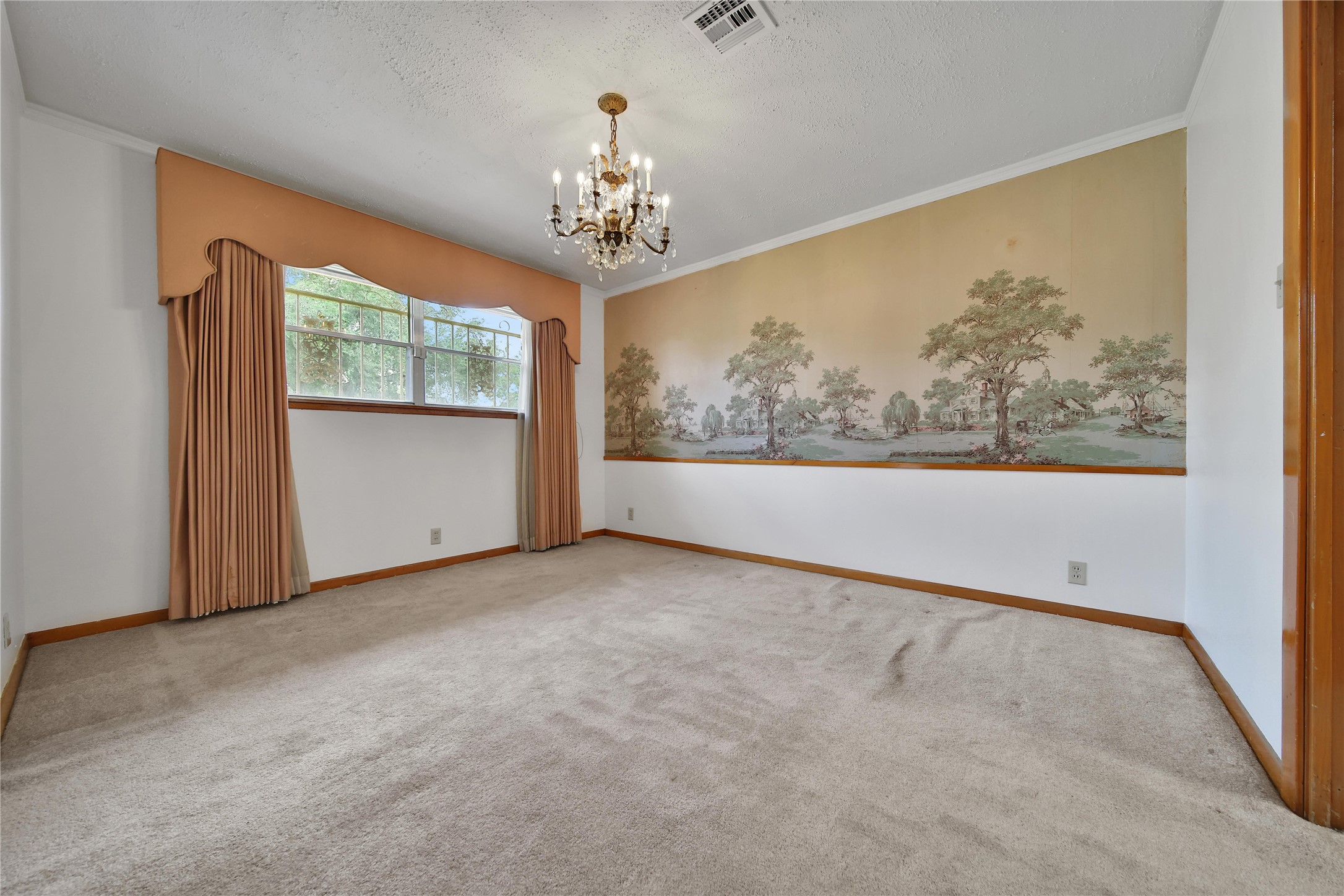 115 East Thornton Road Houston, TX 77022 - Photo 7 of 40 wooden floor in an empty room with a window