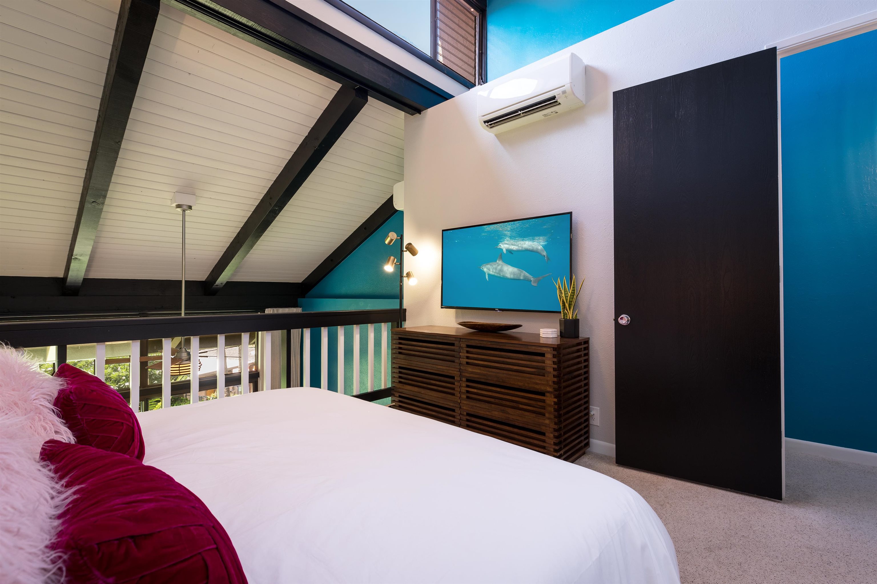 940 South Kihei Road, Unit B309 Kihei, HI 96753 - Photo 13 of 29 a bedroom with a bed and a flat screen tv