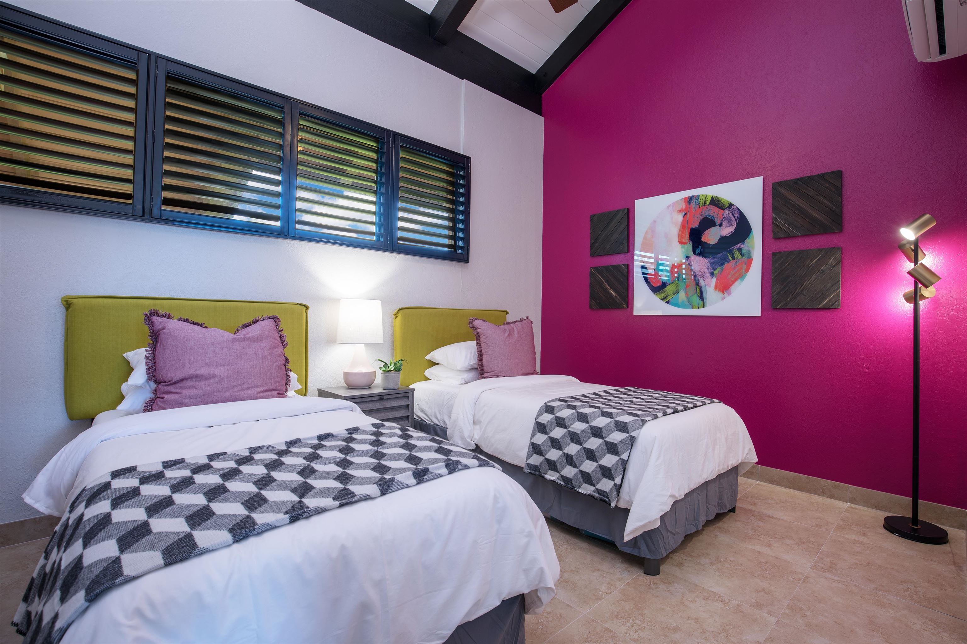 940 South Kihei Road, Unit B309 Kihei, HI 96753 - Photo 22 of 29 a bedroom with two beds and painting on the wall