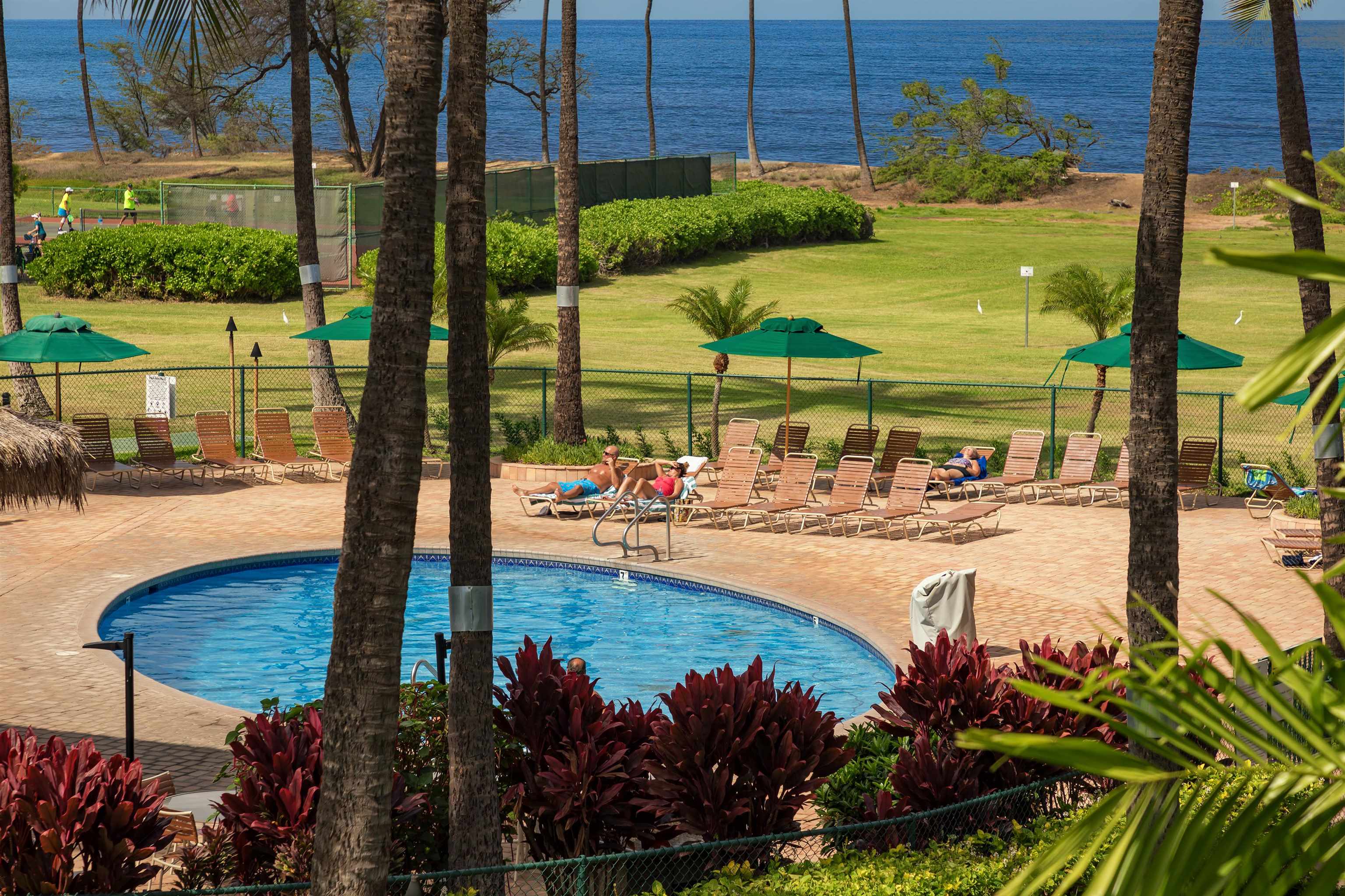 940 South Kihei Road, Unit B309 Kihei, HI 96753 - Photo 8 of 29 a view of a swimming pool with a patio