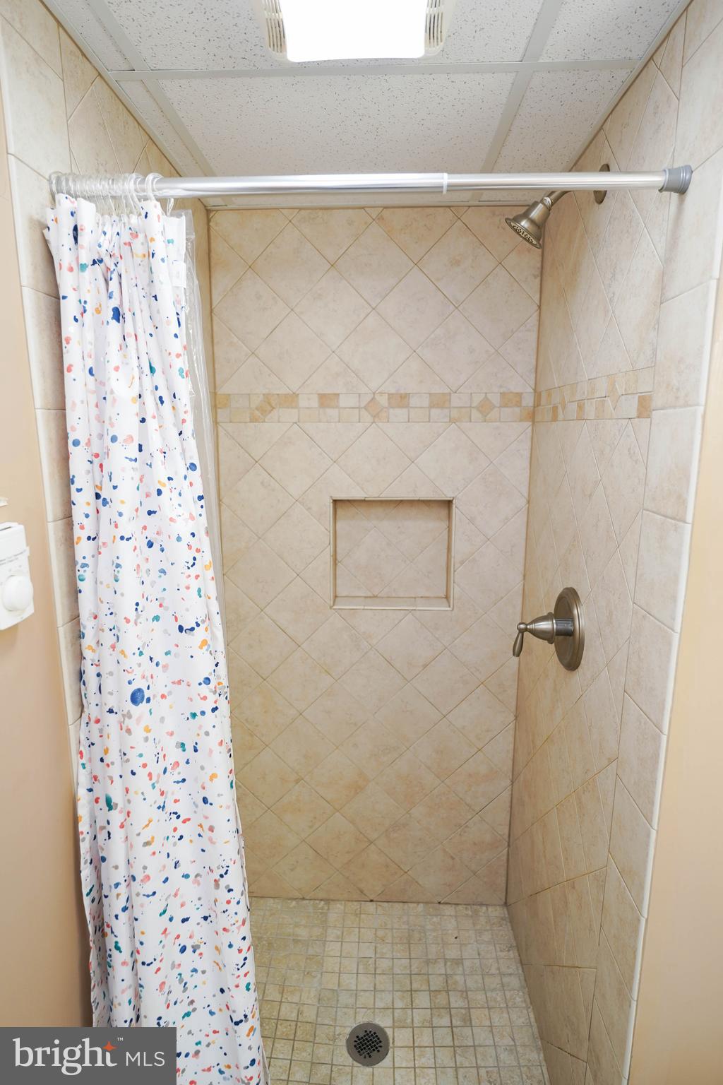 17 139th Street, Unit 101 Ocean City, MD 21842 - Photo 20 of 28 a bathroom with a shower