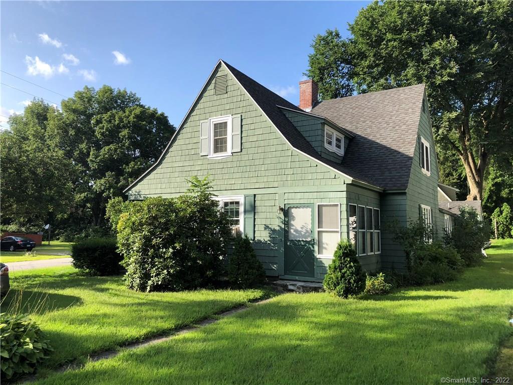 44 North Street Killingly, CT 06239 - Photo 1 of 1 a view of a house with a yard and potted plants