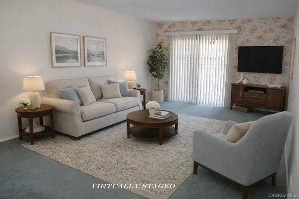 a bedroom with a bed and couch