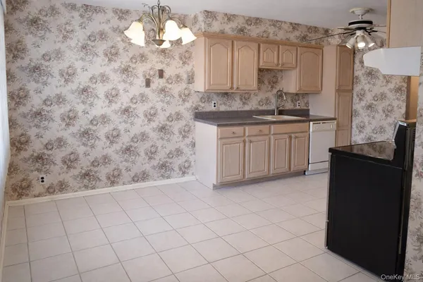 a bathroom with a sink a vanity and a mirror