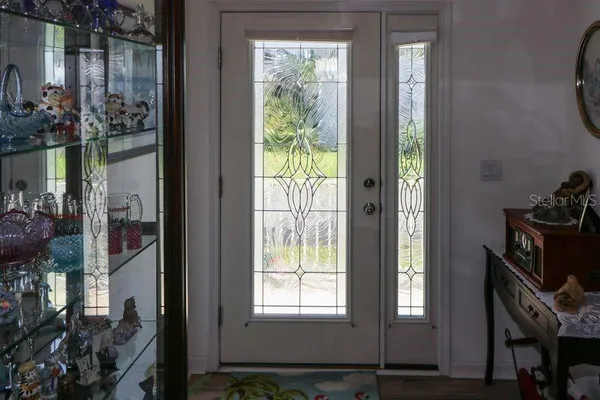 a view of an entryway with a front door