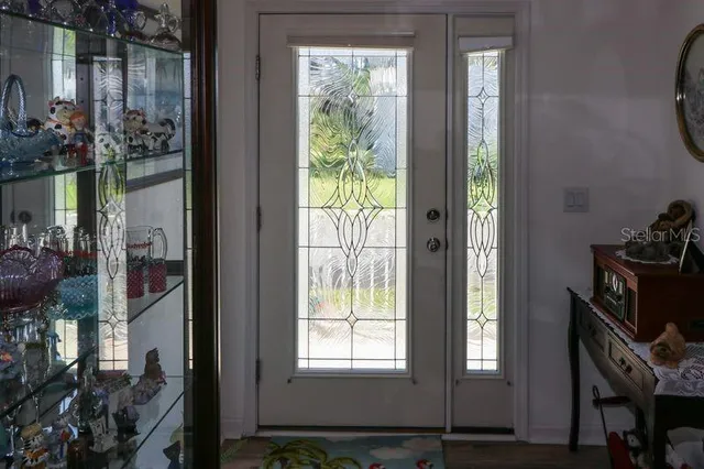 a view of an entryway with a front door