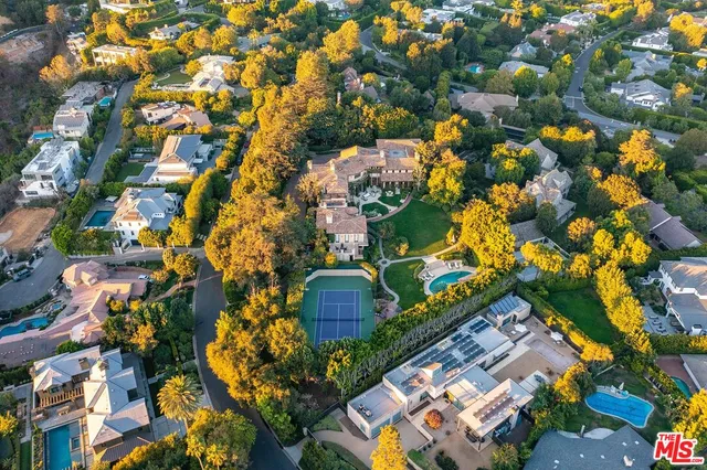 a view of street with large trees