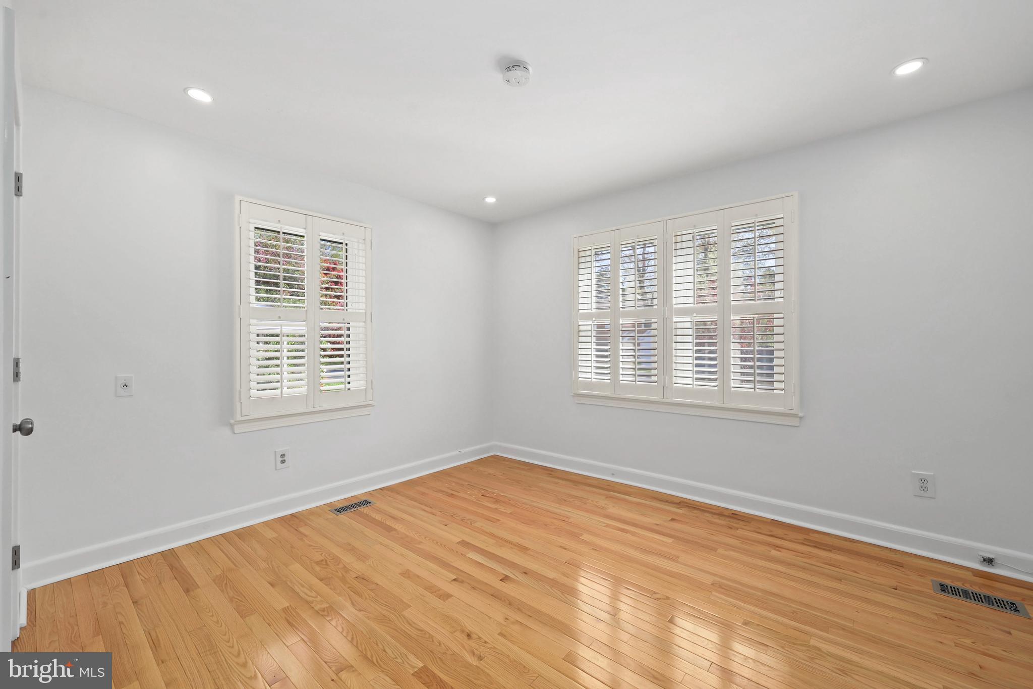 9106 Battle Street Manassas, VA 20110 - Photo 14 of 50 a view of an empty room with a window