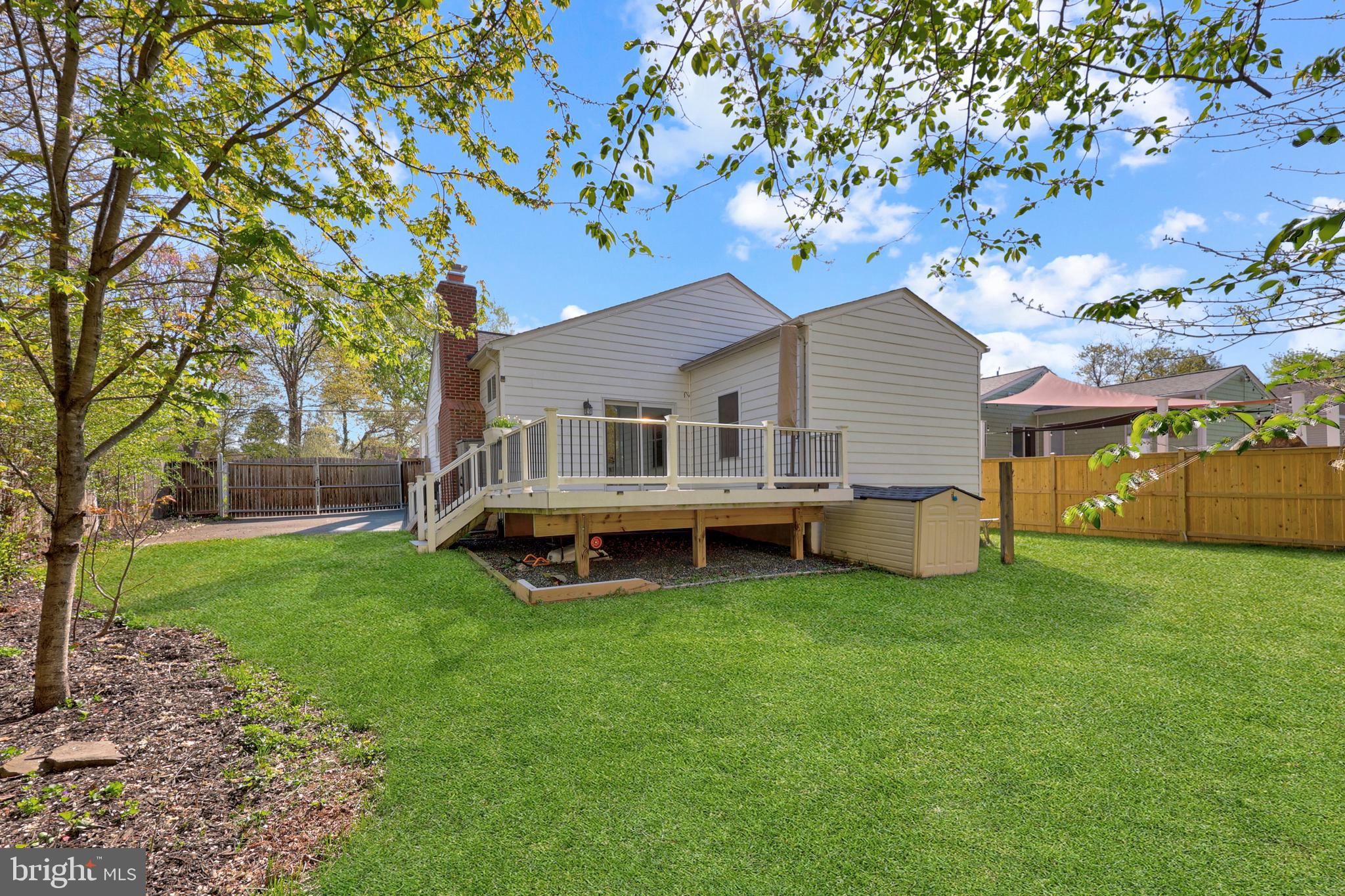 9106 Battle Street Manassas, VA 20110 - Photo 45 of 50 a view of a house with a yard porch and sitting area