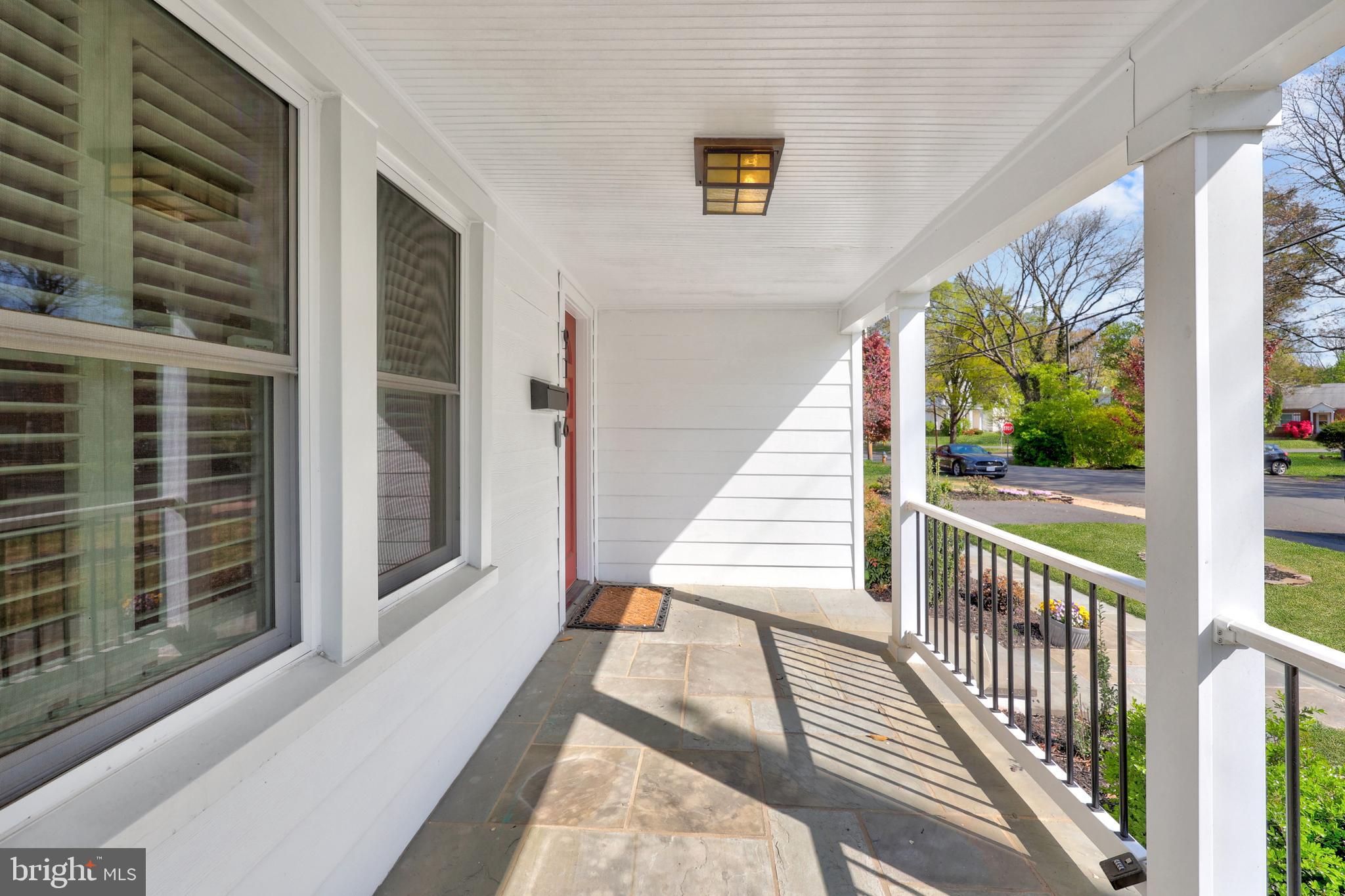 9106 Battle Street Manassas, VA 20110 - Photo 5 of 50 a balcony with wooden floor and outdoor space