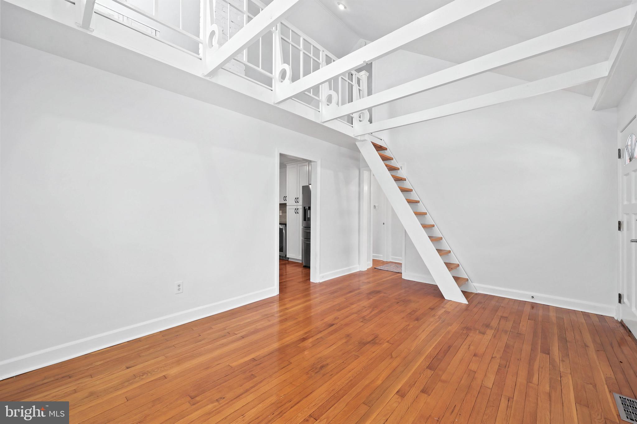 9106 Battle Street Manassas, VA 20110 - Photo 9 of 50 a view of entryway and hall with wooden floor