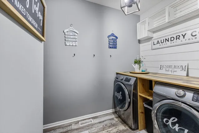 a utility room with dryer and washer