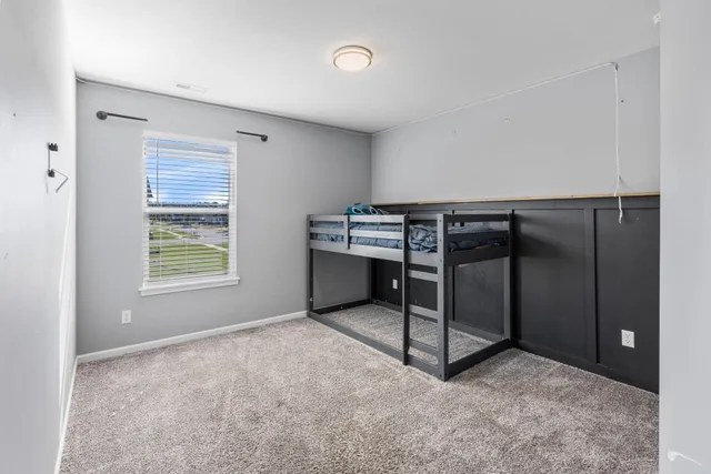 a room with furniture and window