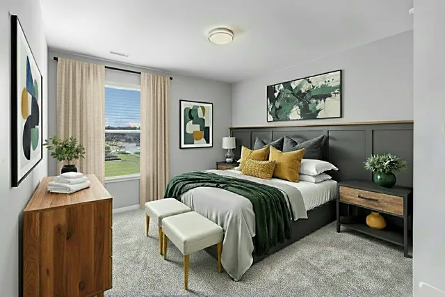 a bedroom with bed and a window