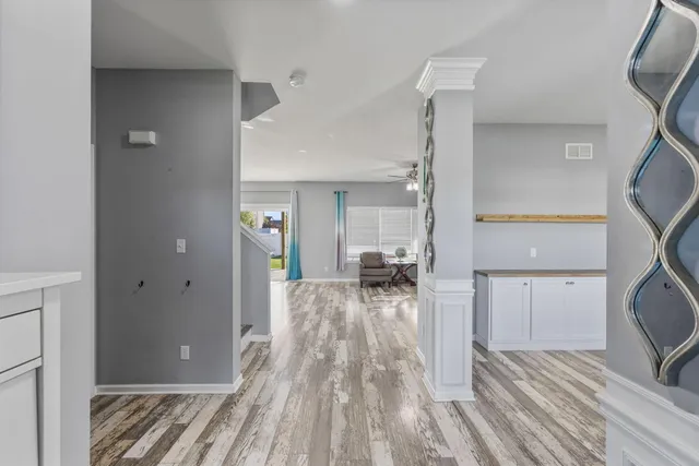 a view of livingroom with furniture and wooden floor