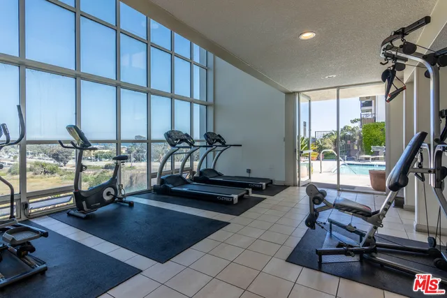 a view of a room with gym equipment