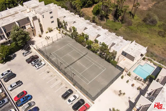 an aerial view of residential house with outdoor space