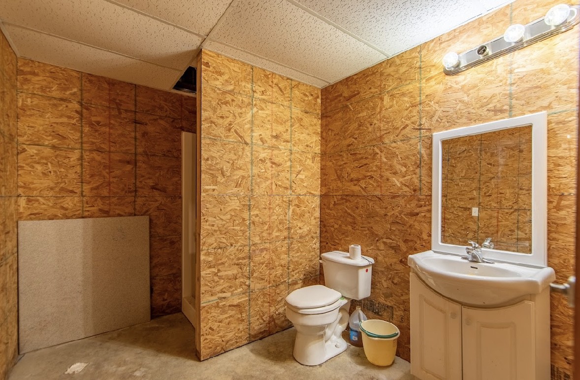22 Ray Road Lawrenceburg, TN 38464 - Photo 54 of 72 a bathroom with a sink a toilet and shower