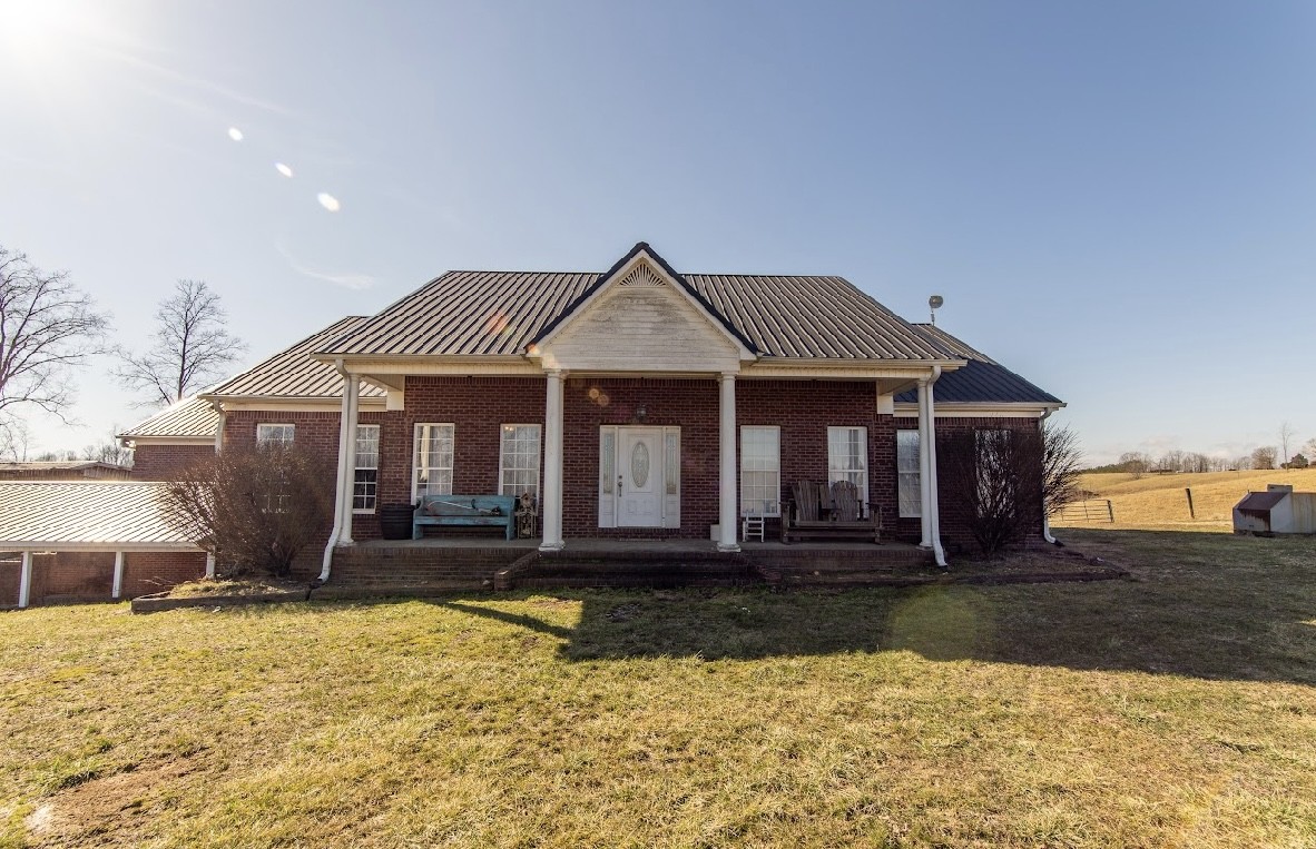 22 Ray Road Lawrenceburg, TN 38464 - Photo 10 of 72 a front view of a house with a yard