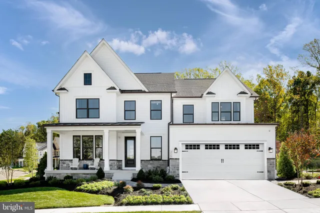 a view of house with yard