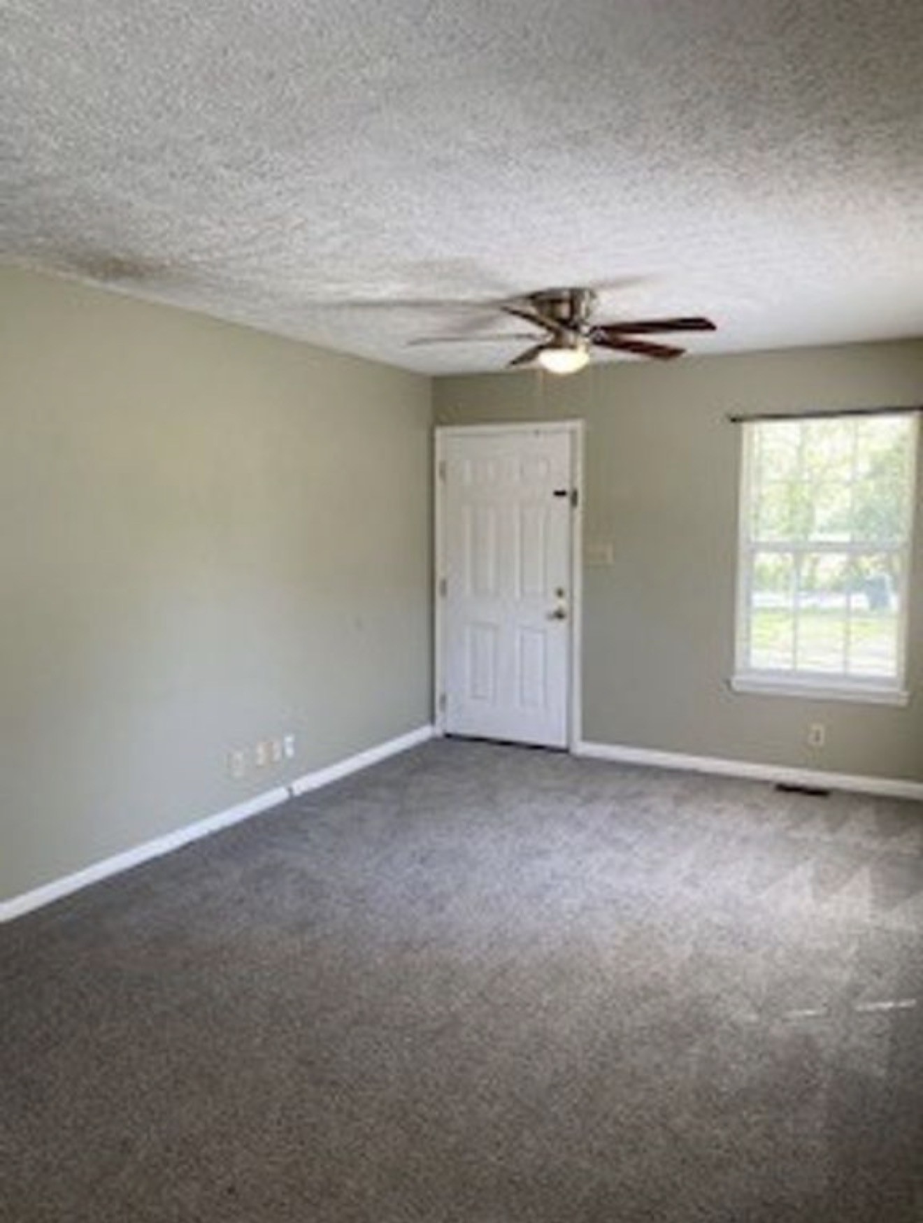 440 Pembroke Oak Grove Road Oak Grove, KY 42262 - Photo 2 of 9 a view of an empty room with a window