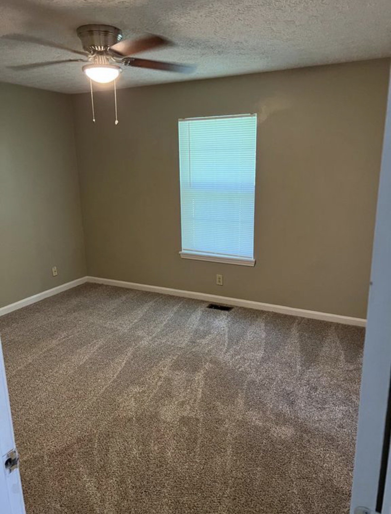 440 Pembroke Oak Grove Road Oak Grove, KY 42262 - Photo 6 of 9 a view of an empty room with a window