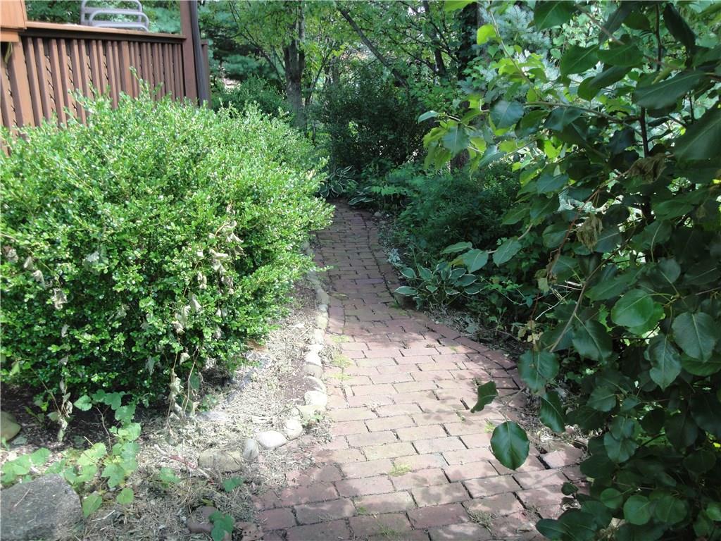 1349 Country Club Road Monongahela, PA 15063 - Photo 13 of 25 Brick walk way that leads to back yard and deck...