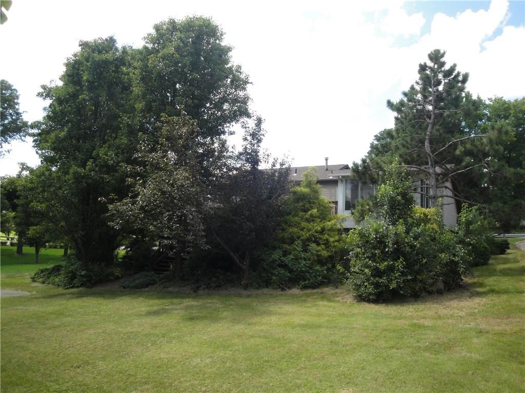 1349 Country Club Road Monongahela, PA 15063 - Photo 5 of 25 Back of home is surrounded by mature landscaping that gives privacy for the sunroom and deck...
