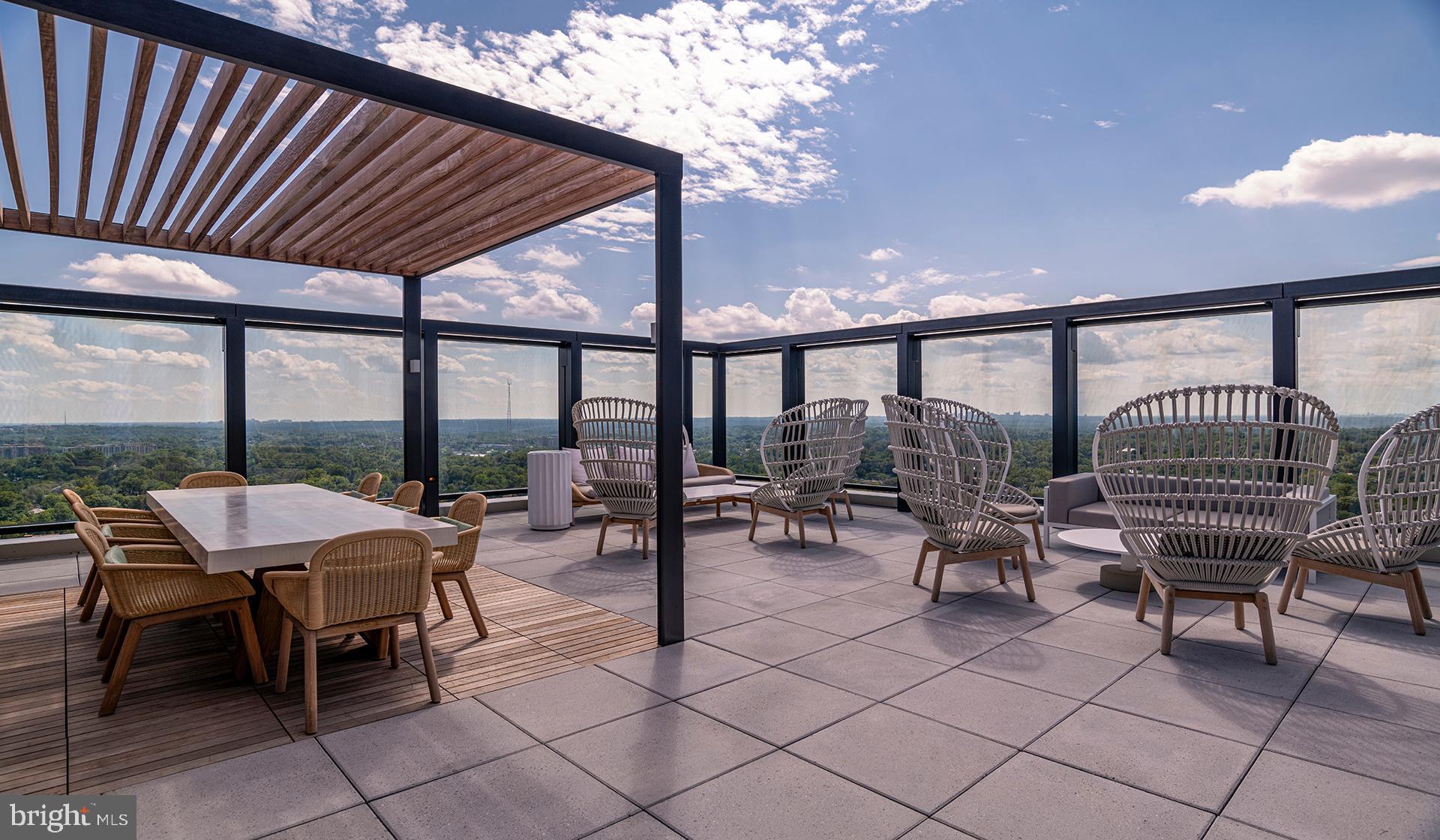 4710 Elm Street, Unit 1BE2003 Bethesda, MD 20814 - Photo 31 of 91 a outdoor space with lots of furniture and chairs