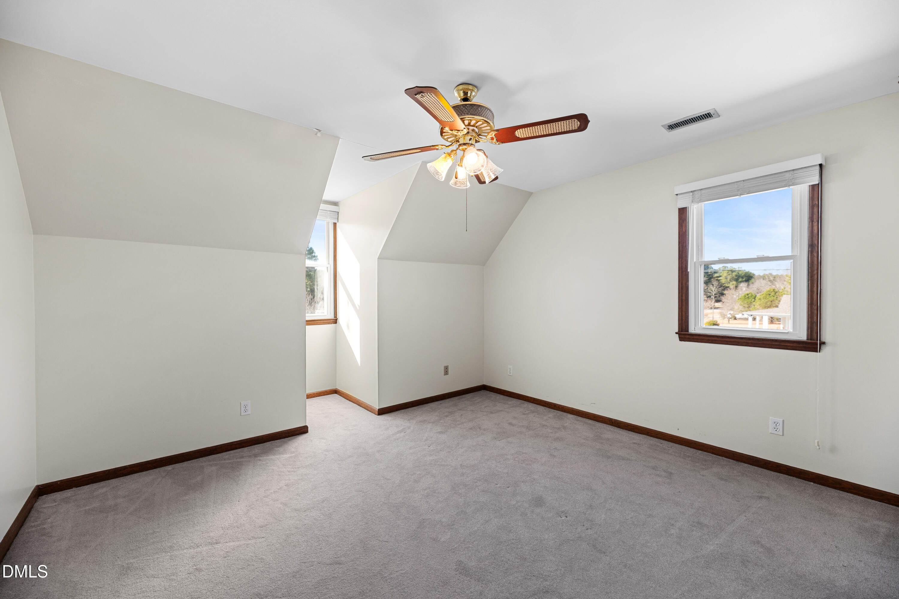 624 Wagstaff Road Fuquay-Varina, NC 27526 - Photo 16 of 39 an empty room with windows and fan