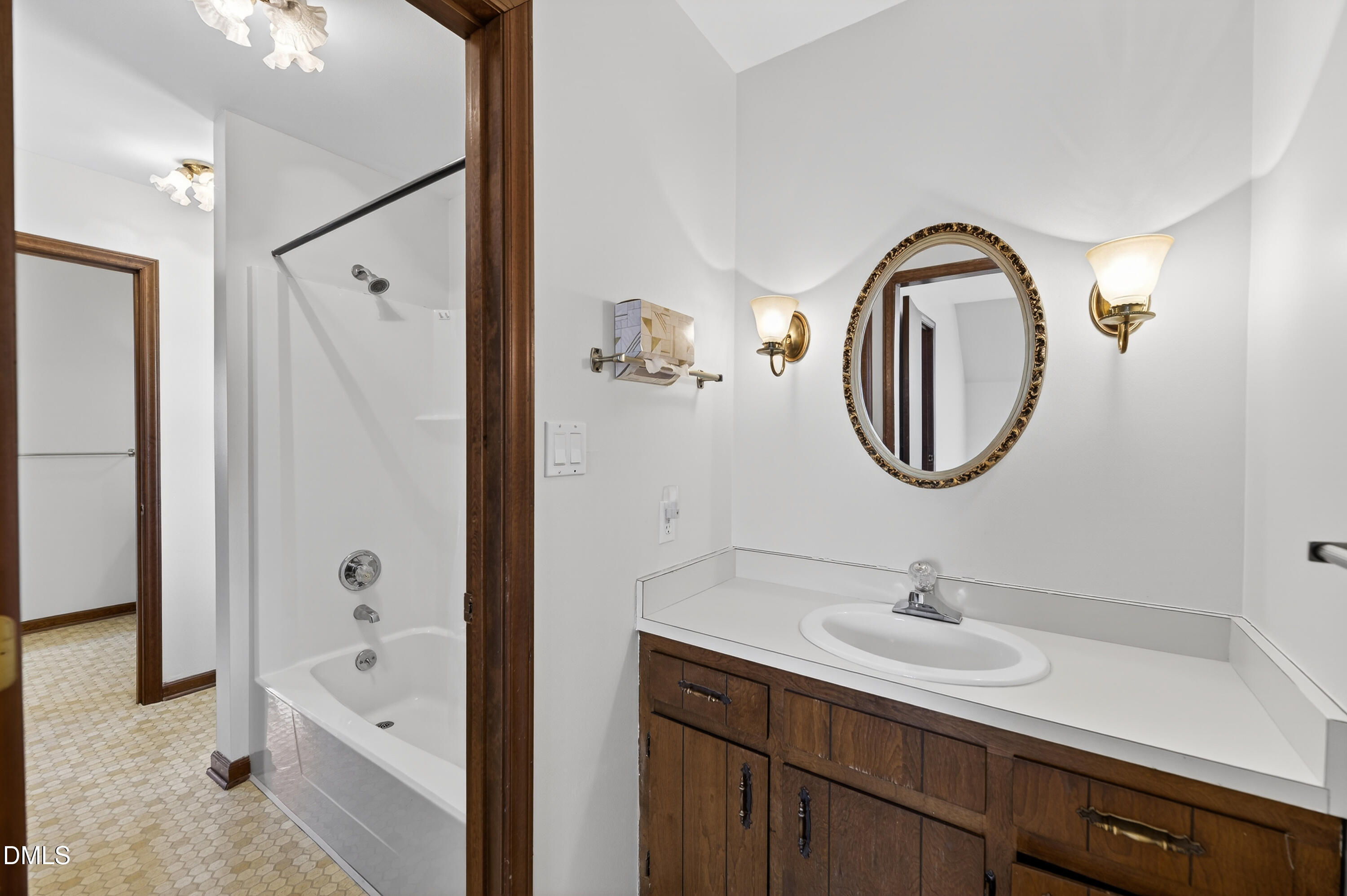 624 Wagstaff Road Fuquay-Varina, NC 27526 - Photo 17 of 39 a bathroom with a tub sink double and mirror