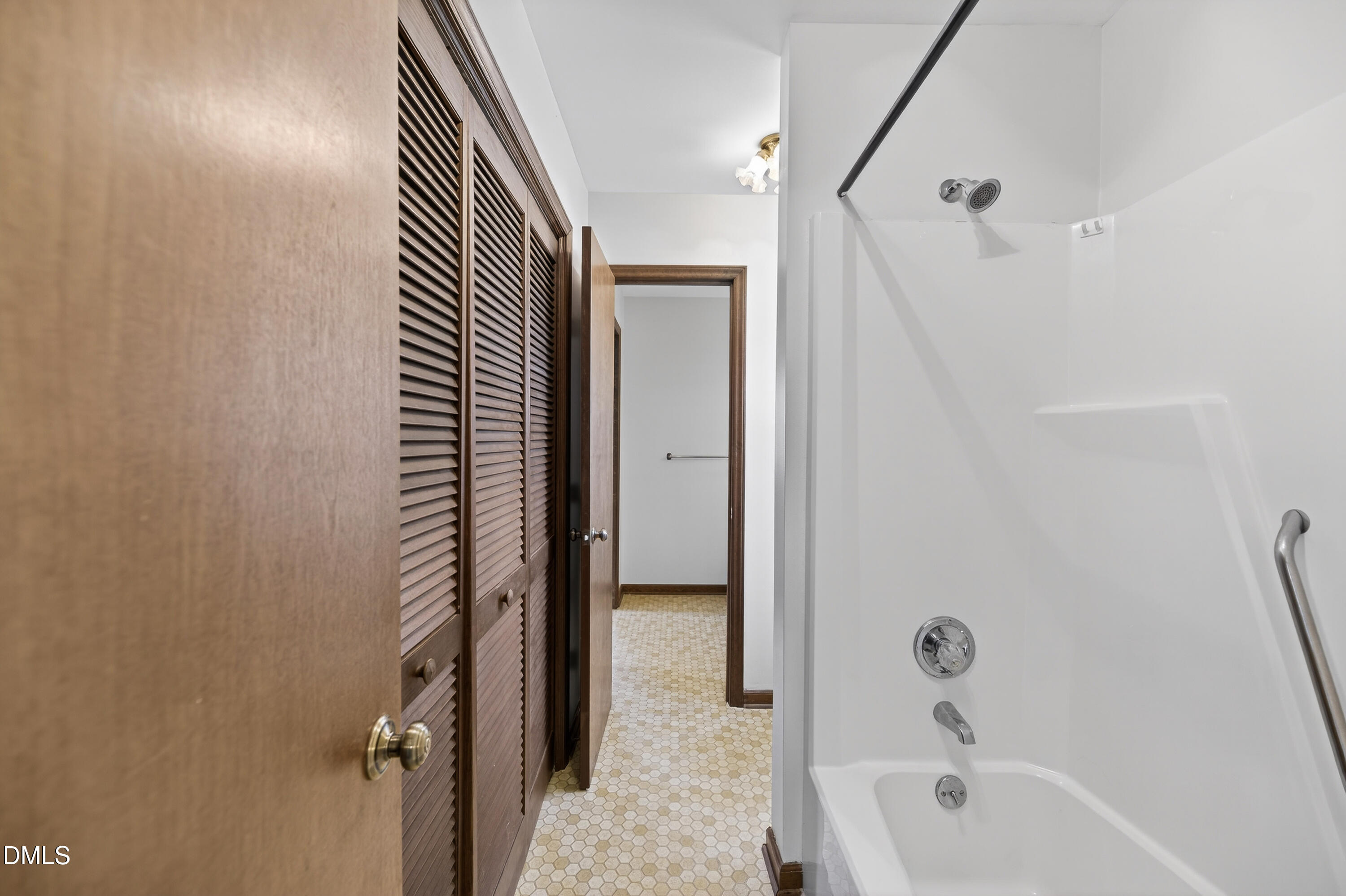 624 Wagstaff Road Fuquay-Varina, NC 27526 - Photo 18 of 39 a bathroom with a bathtub and a shower
