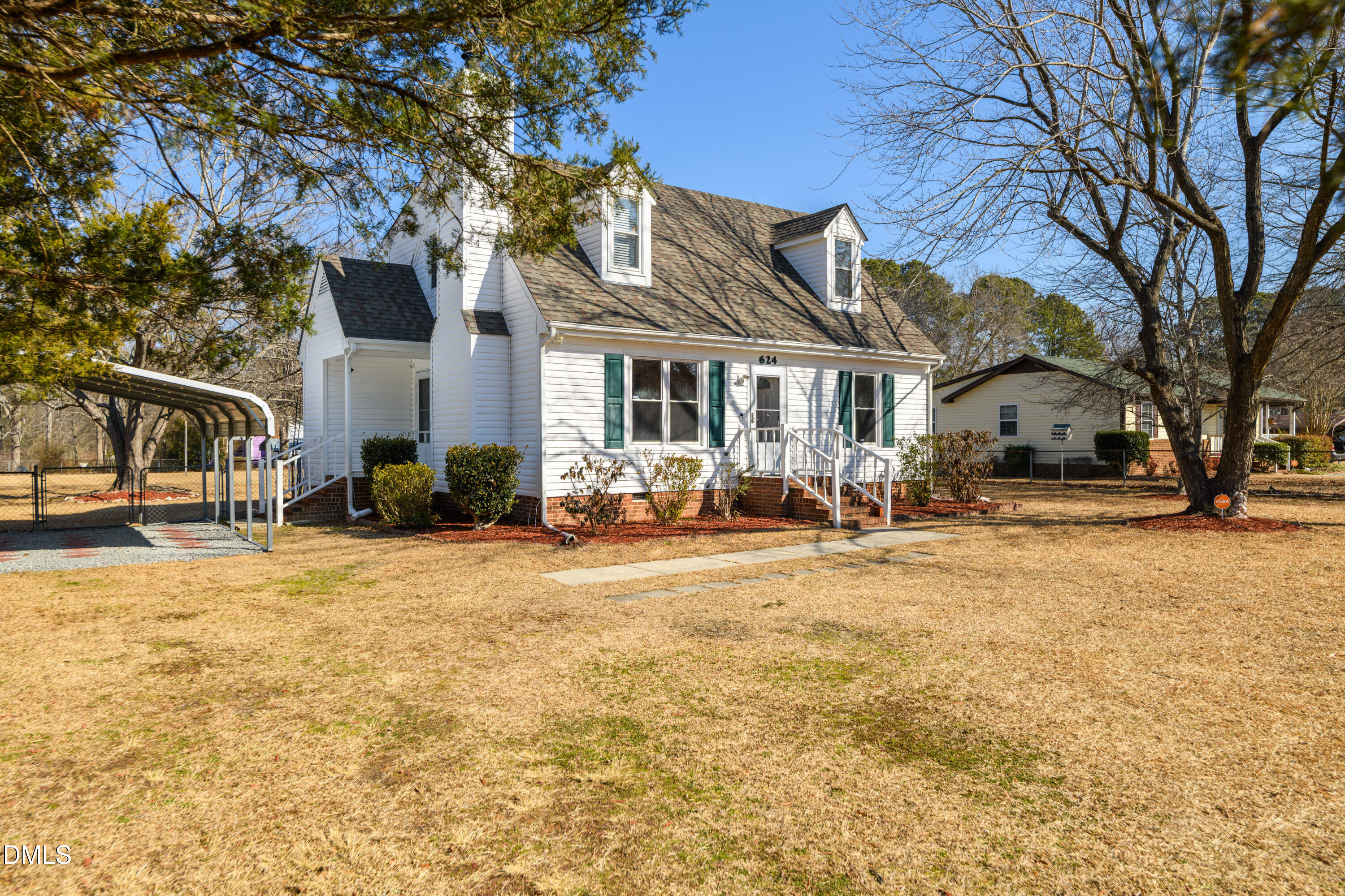 624 Wagstaff Road Fuquay-Varina, NC 27526 - Photo 2 of 39 a front view of a house with a yard
