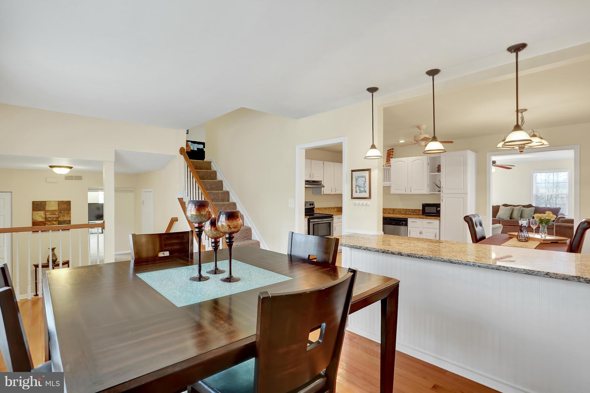 143 Choptank Road Stafford, VA 22556 - Photo 8 of 30 Dining Room with large granite topped peninsula