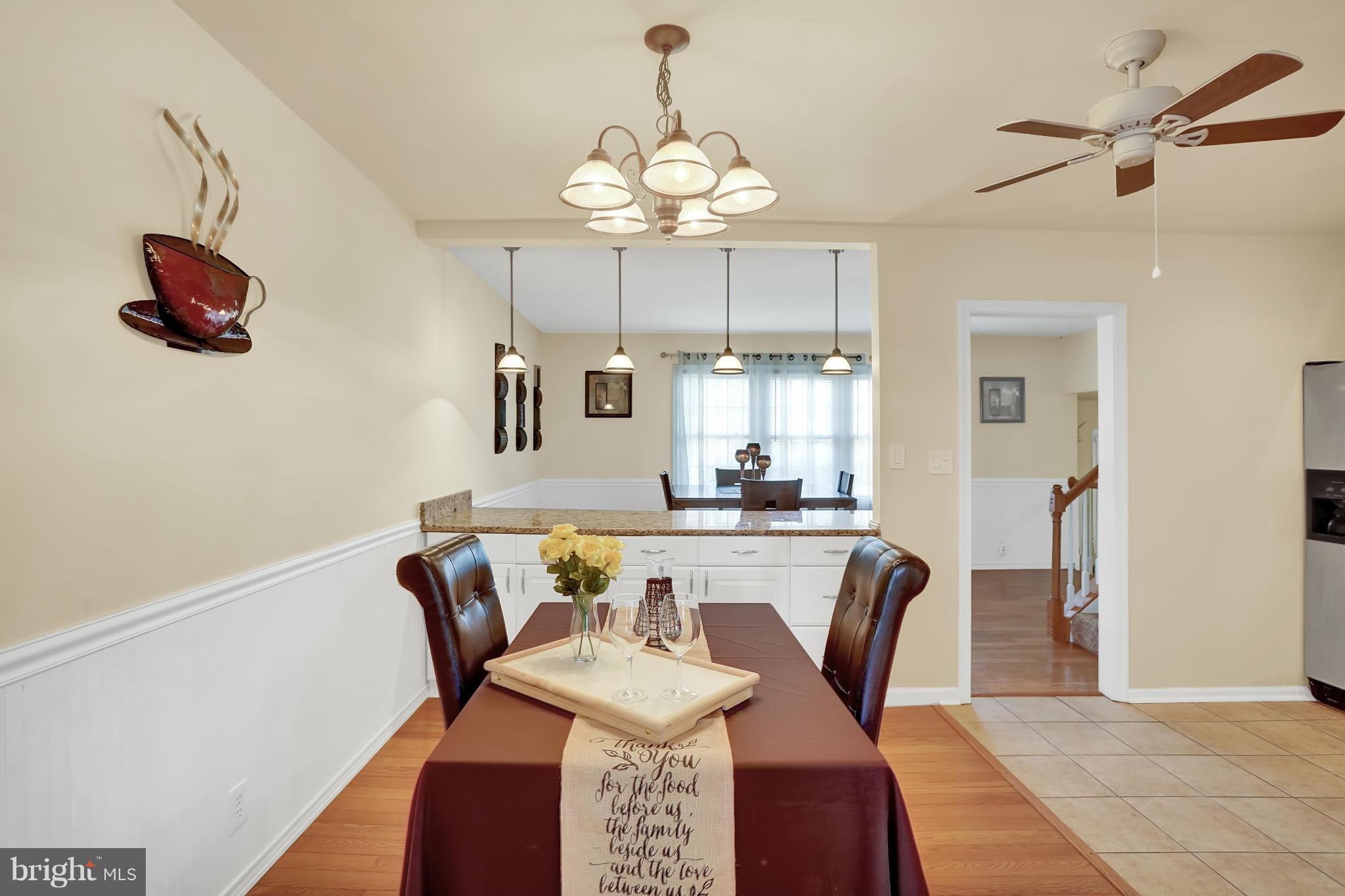143 Choptank Road Stafford, VA 22556 - Photo 9 of 30 Breakfast rm with HW floor adjacent to the kitchen