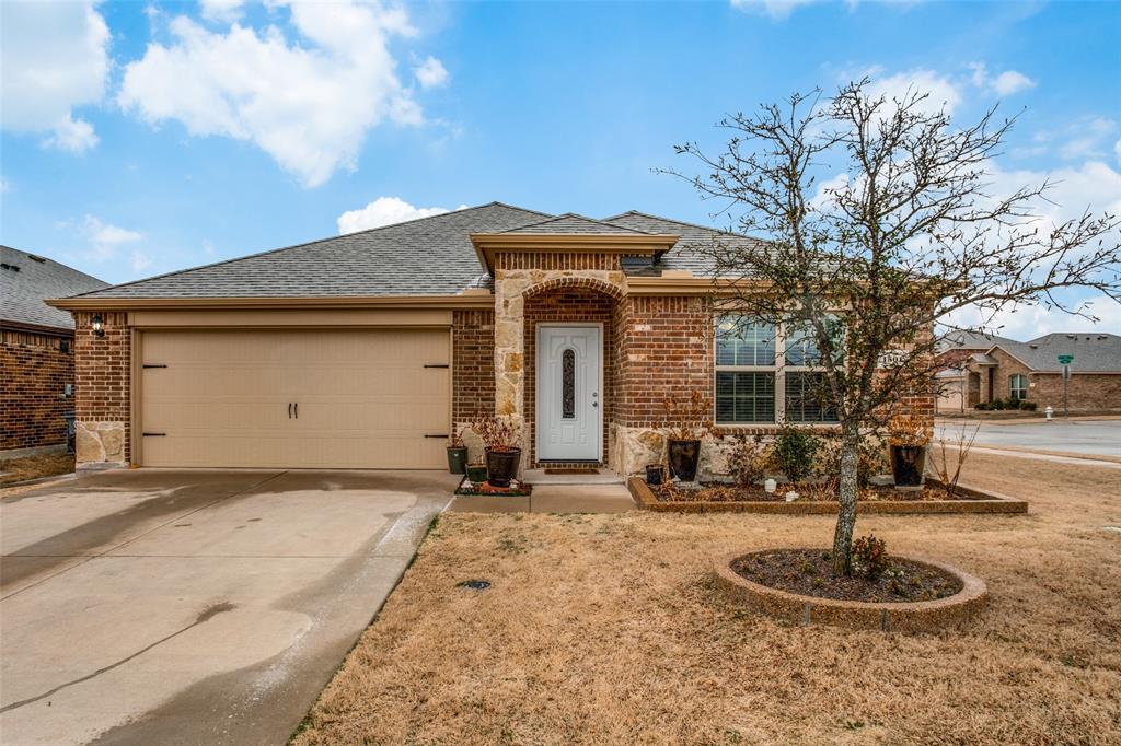 1501 Slate Street Princeton, TX 75407 - Photo 1 of 1 a front view of a house with a yard