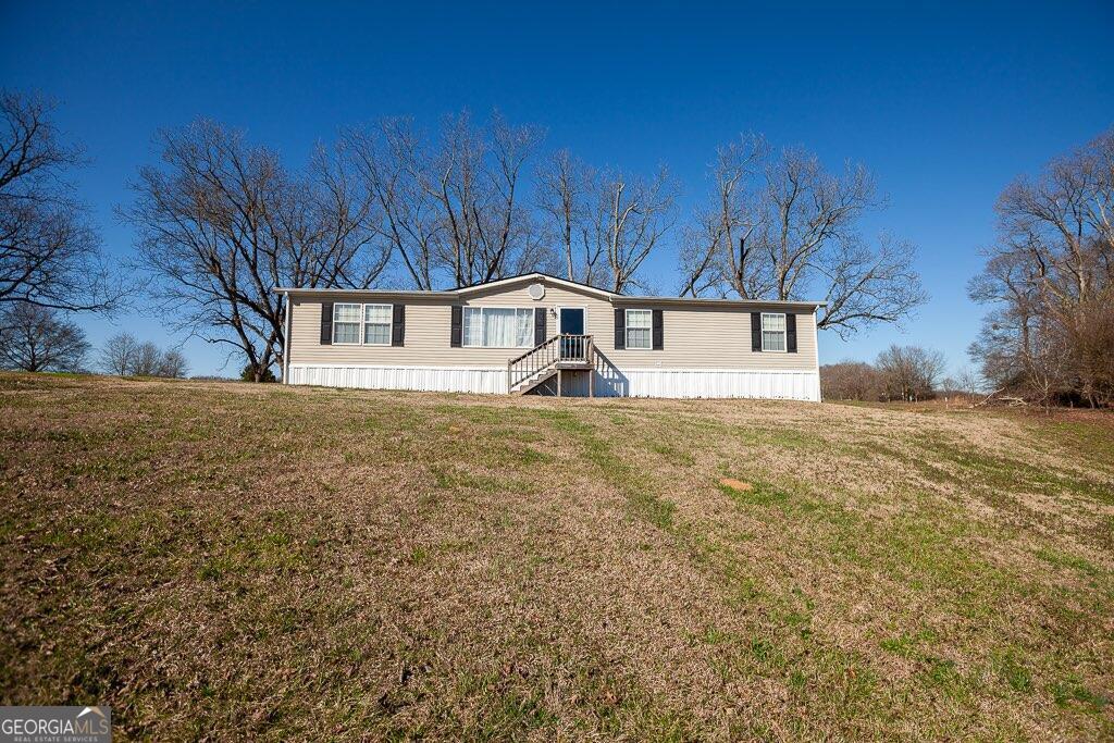610 Joe Findley Road Royston, GA 30662 - Photo 1 of 1 a view of swimming pool with a yard