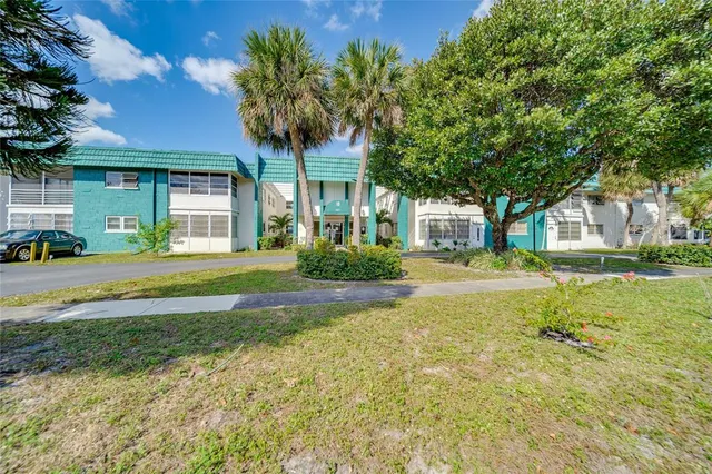 a house view with a garden space