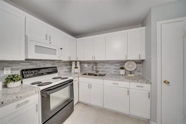 a living room with furniture and window