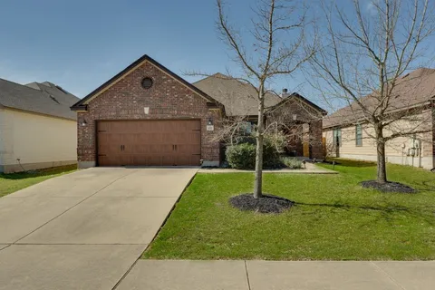 a house view with a garden space