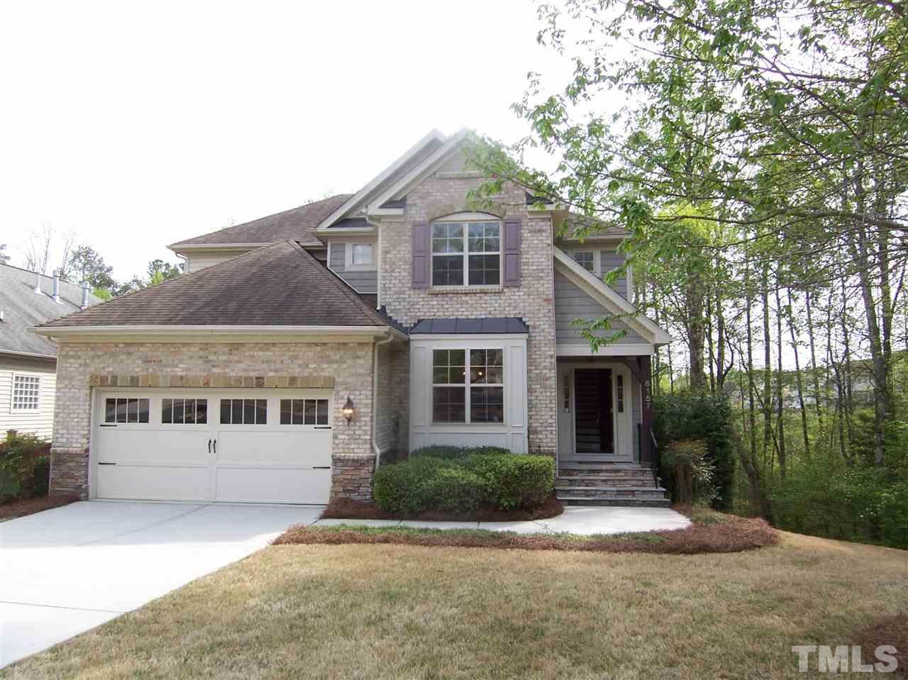 6157 Blakeman Lane Raleigh, NC 27617 - Photo 1 of 25 a front view of a house with a yard