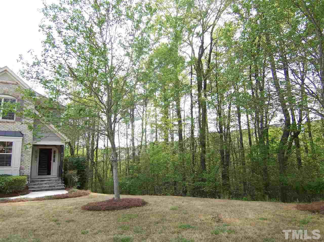 6157 Blakeman Lane Raleigh, NC 27617 - Photo 2 of 25 a view of a backyard of the house