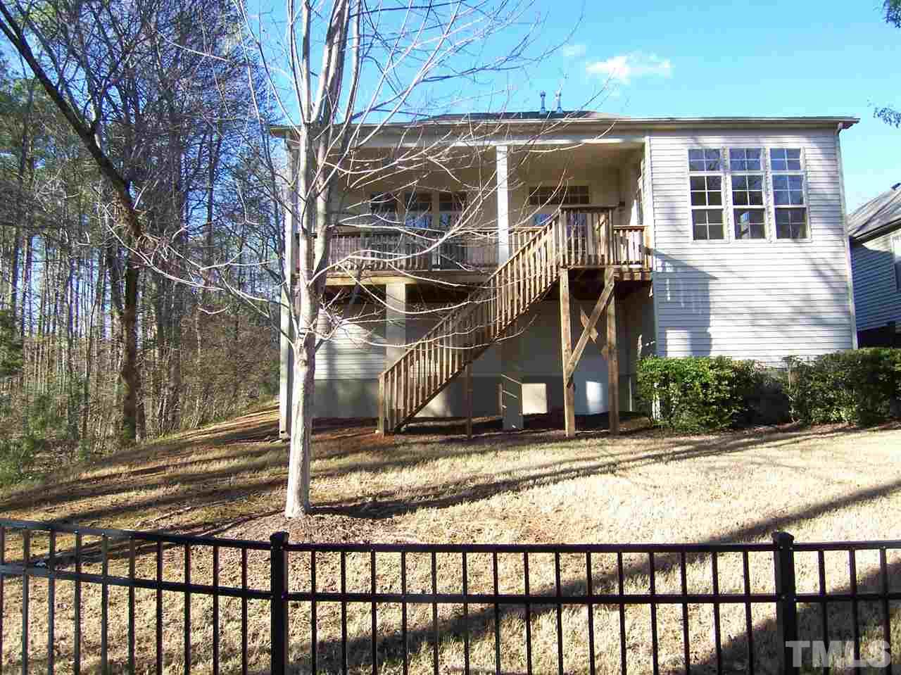 6157 Blakeman Lane Raleigh, NC 27617 - Photo 22 of 25 a view of a house with a small yard